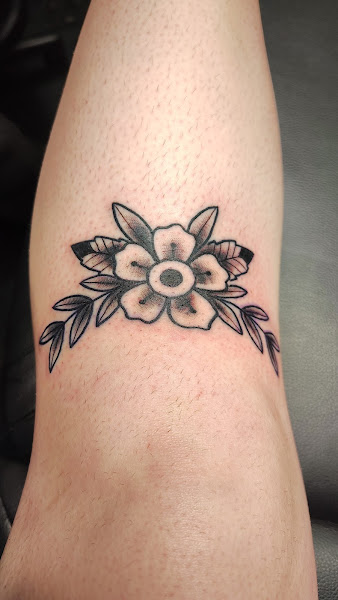 Nine Lives Tattoo and Piercing