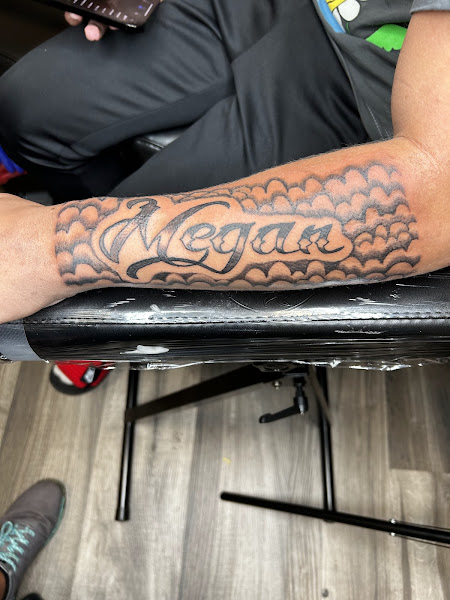 Liquid Xtasy Tattoo